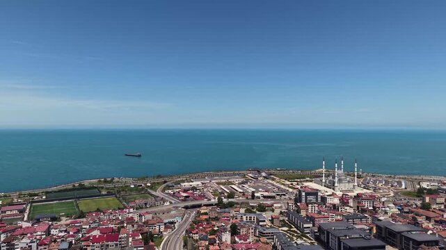 Peaceful Coastal Environment Blending Nature and Modern Development