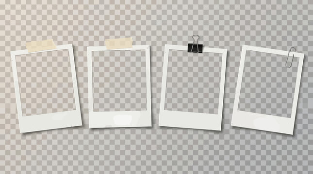 Four empty instant photo frames with tape and clips on a transparent checkered background, perfect for displaying memories.