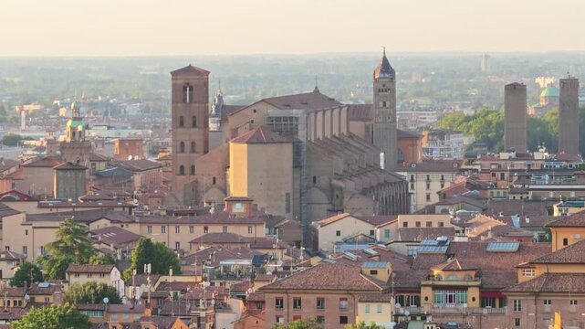 Bologna featuring a historic urban cityscape with traditional terracotta rooftops. Ancient churches like The Basilica Saint Petronius, dedicated to Bishop Petronius, patron saint of Bologna in Italy
