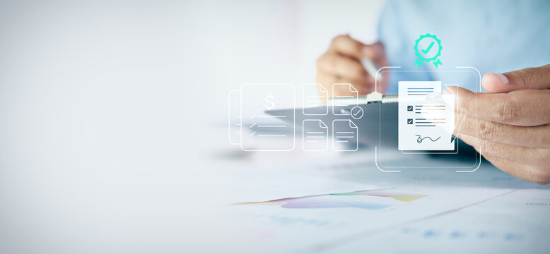 Businessman reviewing business financial reports and charts on desk with copy space, concept of data analysis, accounting, business planning, and corporate performance review