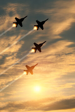 Air Force Day. Aircraft silhouettes on background of sunset. Combat flight of interceptors on a mission. Vertical poster.