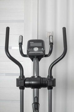 Elliptical trainer console and handles at home