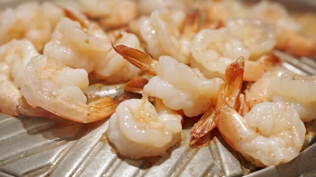 Raw Shrimp on Metal Tray, Seafood Close Up with Grilled Texture and Crisp Edges