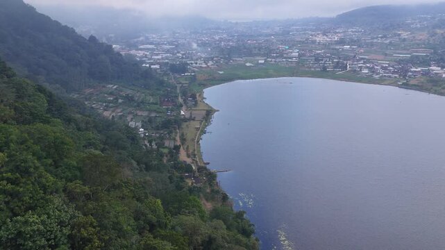 Cultivated Land And Rural Settlements At Lake Buyan In The Volcanic Highlands Of Bali, Indonesia. Aerial Drone Shot
