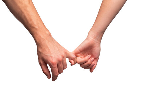 Woman and man couple linking pinky fingers together