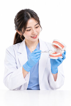 female doctor holding a syringe