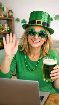 Cheerful Woman with Shamrock Sunglasses Celebrating St. Patrick's Day on a Video Call