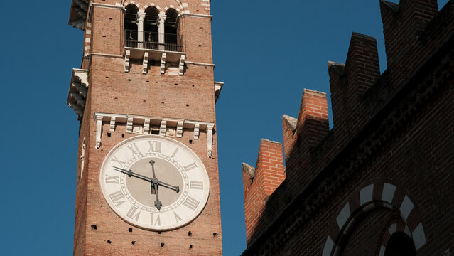 Historical clock on the Lamberti Tower in Verona, Veneto