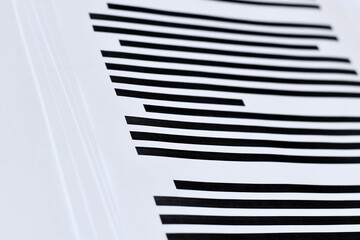 Fototapeta na wymiar Close up of documents with fully blacked out text. Censorship secrecy and hidden information concept