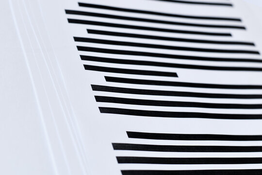Close up of documents with fully blacked out text. Censorship secrecy and hidden information concept
