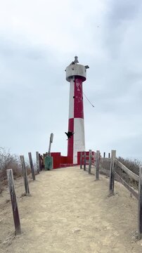 San Lorenzo Lighthouse, gradually revealed from the trail, in the province of Manab&iacute;, Ecuador.