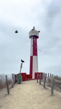 San Lorenzo Lighthouse, gradually revealed from the trail, in the province of Manab&iacute;, Ecuador.