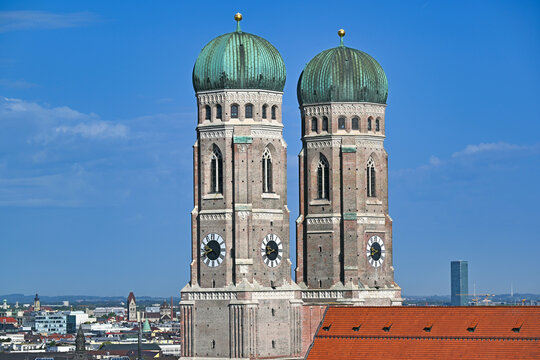 Famous twin towers of Frauenkirche cathedral against blue sky in Munich, Bavaria, Germany