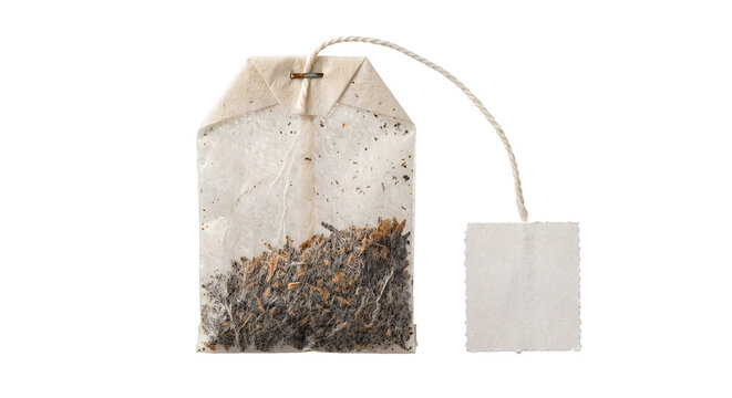Realistic tea bag with blank label isolated on transparent background for beverage branding