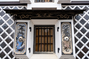 Japanese Storehouse Window With Dragon Relief Carvings © Tatsunori.510