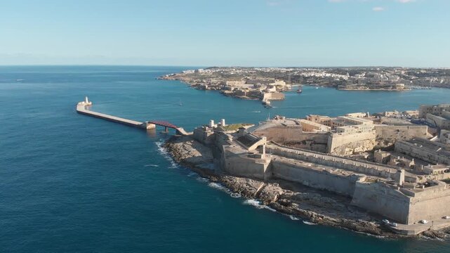 Beautiful Aerial Drone View of Valletta, Malta, Historic Mediterranean Cityscape with Golden Stone Buildings, Coastal Waters and Scenic Architecture, Stunning Travel Destination and Urban Landscape