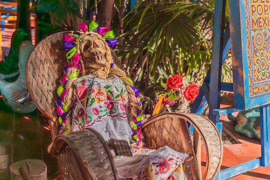 Mexican Day of the Dead skeleton woman figure in colorful traditional style, folk art decoration, cultural heritage and Dia de los Muertos symbol concept
