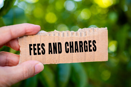 Fees and charges text concept photo