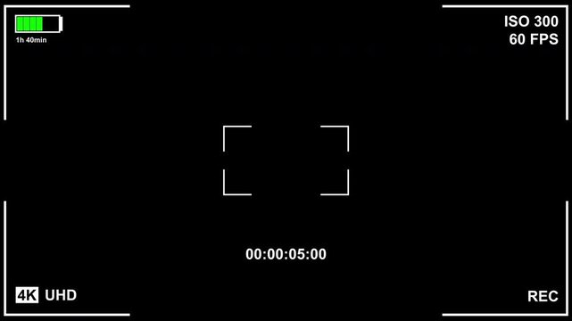 Futuristic UHD camera viewfinder animation with central focus brackets, timecode, battery meter, ISO settings and 60 FPS display, isolated on an alpha channel in 4K resolution
