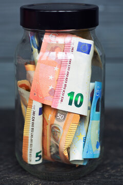 Euro banknotes in glass jar as money savings concept, Financial growth, euro money. Money savings, investment, budget planning, retirement fund, and financial growth concept