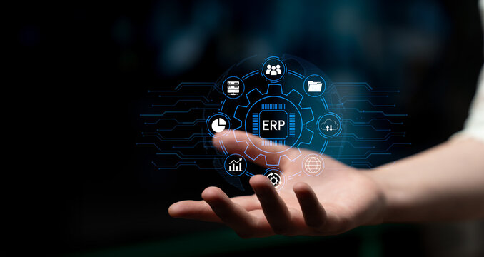 User Hand Reaching Out Towards Floating Icons Signifying ERP System and Business Management Concepts in a Futuristic Digital Environment. Entropy.