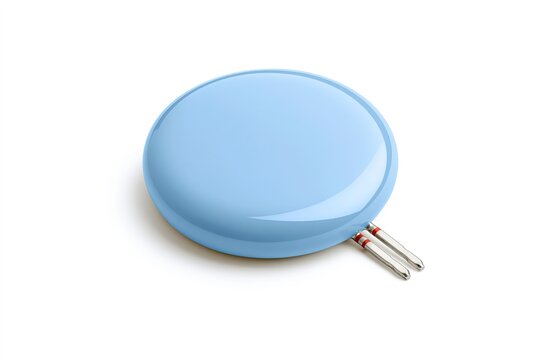 Blue, round object with two metallic prongs featuring red stripes.