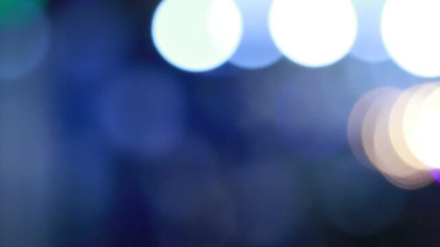 Blue bokeh abstract background with soft circular glowing lights for artistic projects and creative design concepts