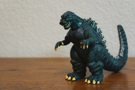 Vintage Godzilla toy on a desk, Sedalia, Missouri, June 2026