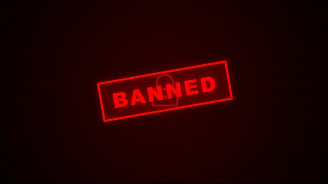 Red banned stamp glowing in darkness