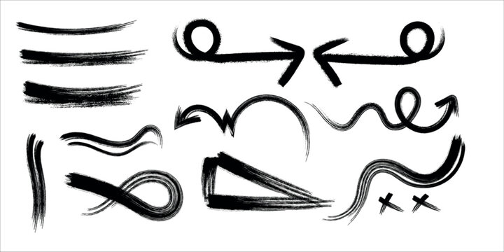 Set of hand drawn charcoal brush strokes and arrows on a white background