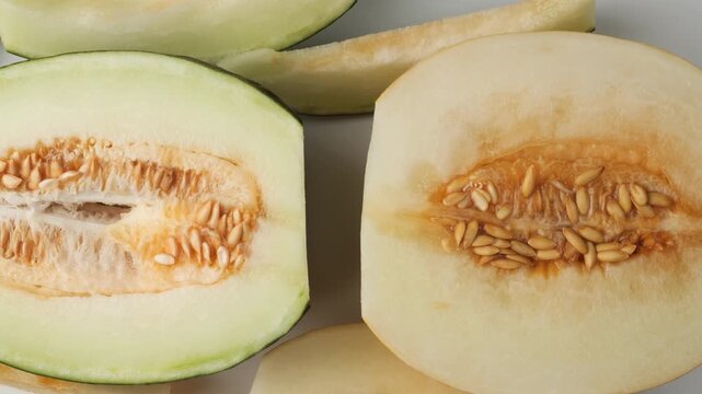 Ripe sliced fresh melon with seeds close-up