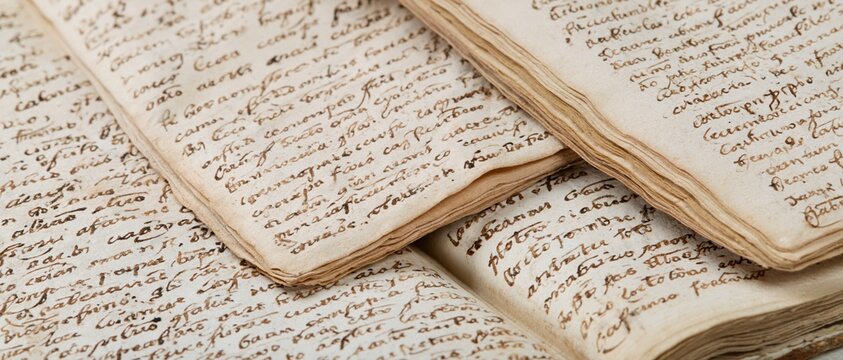 The Manuscript Pages Closeup: Vintage Handwritten Documents on Aged Parchment