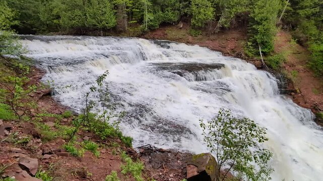 Raindrops feed the rushing waters of Agate Falls in the Upper Peninsula of Michigan