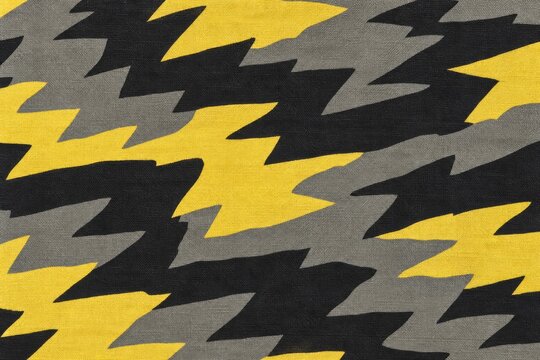 Yellow black gray lightning bolt pattern textile