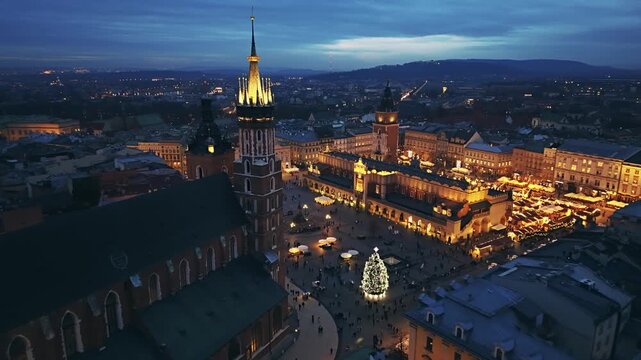 Krakow Christmas Market at Dusk, St. Mary's Basilica & Town Hall Tower