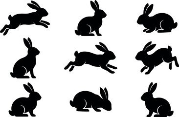 Collection of nine black rabbit silhouettes in various playful and natural poses © Razia