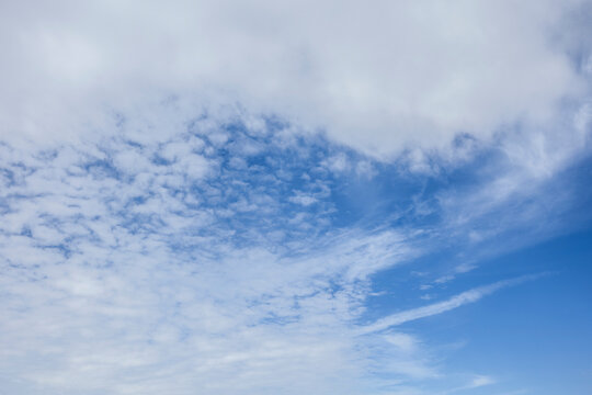 Dramatic White Cloud Formations Against a Deep Blue Sky