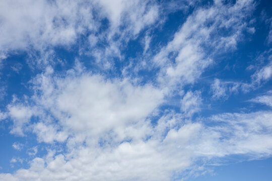Dramatic White Cloud Formations Against a Deep Blue Sky