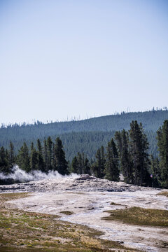 Geothermal Geysers and Colorful Hydrothermal Landscapes Around Old Faithful in Yellowstone National Park, Wyoming, USA