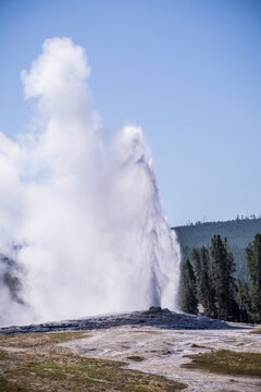 Geothermal Geysers and Colorful Hydrothermal Landscapes Around Old Faithful in Yellowstone National Park, Wyoming, USA