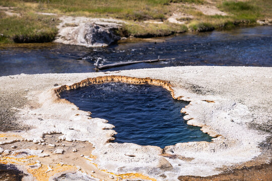 Geothermal Geysers and Colorful Hydrothermal Landscapes Around Old Faithful in Yellowstone National Park, Wyoming, USA