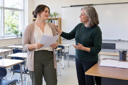 Teacher rehearsing classroom return with a mentor. Professional development and educational support concept
