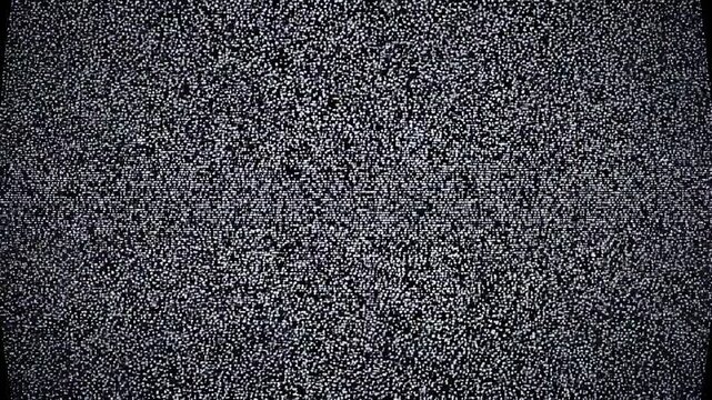 Television static screens in dark room with subtle grain and soft focus for retro broadcast concept