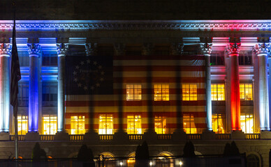 Obraz premium Agriculture building with patriotic facade. Agriculture department displays American flag. Federal lights illuminate agriculture columns. Historic architecture marks agriculture ceremony.