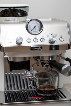 Modern Stainless Steel Espresso Machine with Built-In Coffee Grinder