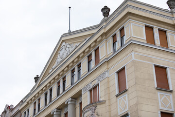 Ornate Neoclassical Building Facade with Columns and Pediment © Ocskay Mark