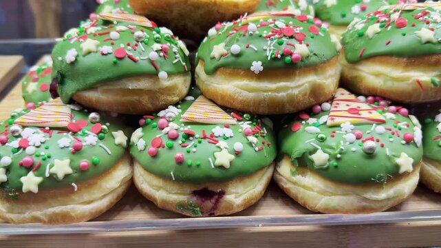 Festive Christmas Donuts Displayed in Warsaw Shop Window