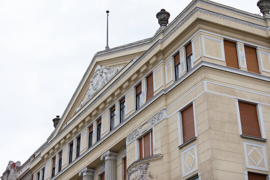Ornate Neoclassical Building Facade with Columns and Pediment