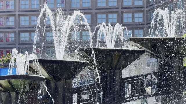 Four fountains spew water in slow motion in Germany