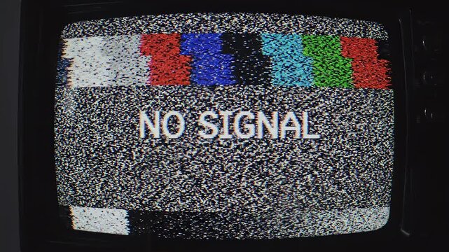 Vintage television screen showing static and test pattern with broadcast disruption